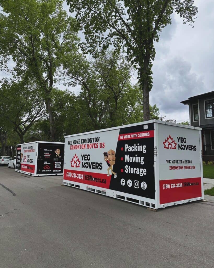 YEG Movers moving storage containers on street.